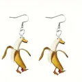 Orecchini divertenti a forma di anatra banana con buccia gialla e ganci argento - Orecchini anatra banana (singola faccia)