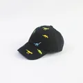 Close-up of colorful dinosaur embroidery on the black cotton baseball cap for kids - 52cm Adjustable / Black