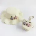 Detail of cream straw sun hat and matching crossbody bag with cute star plush ornaments - Shoulder Bag / Milk White (Star)
