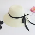 Creamy white woven straw sun hat for boys featuring an elegant black grosgrain ribbon bow - M Adult 58cm / Cream-Black Ribbon