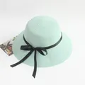 Mint green straw sun hat featuring a delicate black ribbon bow for women - Green / M Black Ribbon Bow Adult Hat 56-58cm