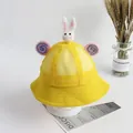 Detail of yellow mesh sun hat for kids featuring cute white felt rabbit and spiral ears - 53cm / Yellow Rabbit Pink Lollipop