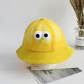Detail of yellow toddler sun hat featuring breathable mesh crown and cute cartoon face - 53cm / Yellow Big Eyes