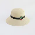 Dettaglio del cappello di paglia con trama intrecciata e ricamo di cactus sul nastro - Beige-Cactus Fascia Nera