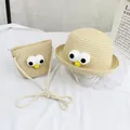 Beiges Strohhut-Set für Kinder mit passender Umhängetasche und lustigen Augen-Dekors - Kinderhut / Beige - Große Augen