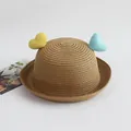 Detail of child straw hat with yellow and blue heart decorations and rolled brim design - Yellow Blue Hearts / Khaki / One Size