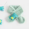 Detail of soft plush light green kids scarf with cute blue cartoon crocodile doll attachment - Crocodile Mint Green
