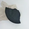 Detailed close-up of black corduroy fabric texture on a vintage children's bucket hat - Small Child 48cm / Black