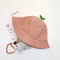 Dettaglio cappello da sole rosa in cotone con foglie verdi e coulisse regolabile - 48cm(1-2 anni) / Rosa Antico