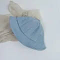 Detailed texture of light blue corduroy fabric on a minimalist kids bucket hat - Small Child 48cm / Haze Blue