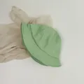 Detailed texture of mint green corduroy bucket hat with soft ribbed fabric design - Small Child 48cm / Mint Green