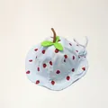 Detail of baby sun hat with strawberry print, green leaf decor and chin strap - Kids (50cm) 1-3Y / Blue
