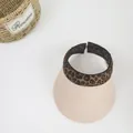 Detailed top view of leopard print straw sun visor hat with textured weave on white background - M (56-58cm) / Pink