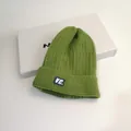 Grass green cable knit beanie featuring a retro VE patch and ribbed texture for winter - M (56-58cm) / Green