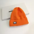 Berretto in maglia arancione vivace con toppa VE per protezione termica e antivento - Taglia unica / Arancione