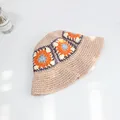 Handmade crochet bucket hat for women with colorful floral patterns and straw texture - M (58cm) / Pink
