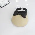 Beige wide brim straw sun visor with large black bow and golden M letter badge - M(55-59cm) / Beige