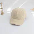 Close-up of a cream-colored fuzzy lamb wool baseball cap with soft minimalist decor - S / Off White