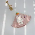Close-up of pink baby bucket hat with plush rabbit patch, carrot charm and embroidery - S(46-48cm) / Pink