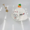 Detail of baby sun hat featuring 3D bunny patch, carrot top, and HELLO embroidery - S(46-48cm) / White