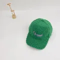 Detail of green faux shearling baseball cap with purple Chaser embroidery and plush texture - Green