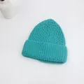 Détails de bonnet en maille turquoise avec texture côtelée épaisse et large revers - Bleu lac
