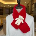 Detail of red plush kids scarf featuring a white 3D stuffed bear on soft faux fur fabric - Red