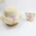 Detail of kids straw sun hat and matching mini bag with pink mesh bow and pearls - Single Hat / Sequin Mesh Bow - Beige