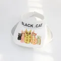 Detailed view of white kids visor featuring Black Cat text and colorful cartoon cat motifs - S Children (48-53cm) / White