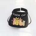Detail of black kids sun hat showing five cartoon cats and Black Cat text on the brim - S Children (48-53cm) / Black