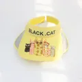 Detailed top view of kids yellow sun hat with cartoon black cat prints and side wings - S Children (48-53cm) / Yellow