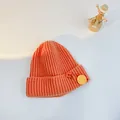 Thick coral orange ribbed knit beanie for kids with yellow smiley face safety pin - S (48-53cm) / Orange (Orange Pin)