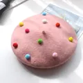 Rosa Woll-Baskenmütze für Kinder mit bunten Bommeln im schlichten Design - S Kinder (48-52cm) / Prinzessinnenrosa