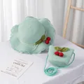 Detail of mint green woven straw hat and matching cherry bag set for girls - Kids Style (Size S) / Green