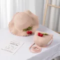 Detail of pink straw hat and crossbody bag with crochet cherry accents for girls - Single Bag / Pink