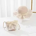 Detail of girls straw sun hat and matching bag set with white lace and ribbon bow - Kids (52cm Hat Only) / Pink (Ruffled)