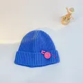 Blue knit baby winter hat with pink smiley pin decoration on solid ribbed texture - S (48-53cm) / Dark Blue (Rose Pin)