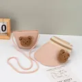 Close-up of pink straw sun hat and matching crossbody bag with cute plush bear decor - Kids Sun Hat / Pink