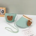 Detail of light green woven straw sun hat and matching crossbody bag with 3D teddy bear - Kids Sun Hat / Green