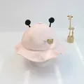 Light pink cotton baby bucket hat with cute black pom-poms and lovely bear patch - Size S (46-48cm) / Pink