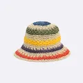 Dettaglio della trama in paglia intrecciata a mano colorata di un cappello da sole a tesa larga - M / Beige