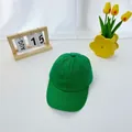 Macro shot of bright green cotton baseball cap with curved brim on minimalist background - 2-8 Years / Green