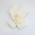 Detailed view of plush beige faux rabbit fur scarf featuring a 3D cute teddy bear ornament - 10*75cm / Off White
