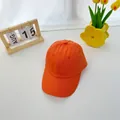 Detailed close-up of bright orange cotton baseball cap with reinforced stitching and eyelets - 2-8 Years / Orange Red