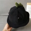 Detailed texture of kids black corduroy sun hat with green plush dinosaur spikes - 48cm (0-2 Years) / Black