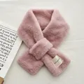 Detail of soft pink faux fur scarf with letter patch and convenient cross-through design - Dusty Pink