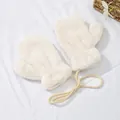 Dettaglio di muffole di peluche crema con calda pelliccia sintetica e cordino al collo - Taglia S (2-6 Anni) / Bianco Sporco