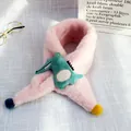 Detailed view of pink plush kids scarf with green crocodile patch and colorful pom-poms - Crocodile Style (Pink)