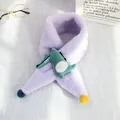 Detail of soft purple plush children's scarf with a green cartoon crocodile and colorful pom-poms - Crocodile Style (Purple)