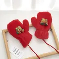 Detail of red plush mittens with a 3D gift box ornament and hanging neck string - Glitter Gift - Red